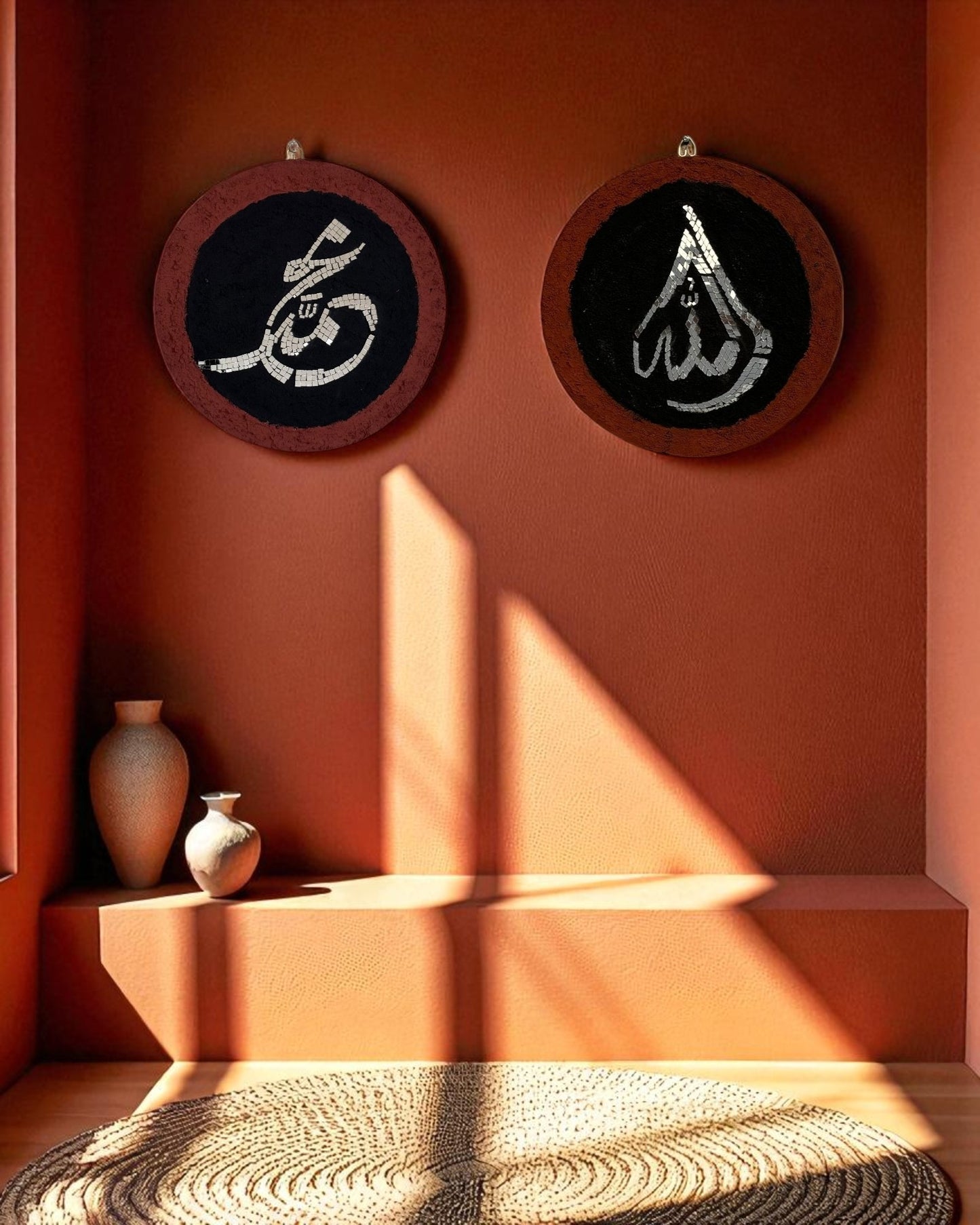 Rustic wall niche featuring handcrafted Islamic mosaic mirrors with deep red border and silver Arabic calligraphy, styled with minimal ceramic accents.