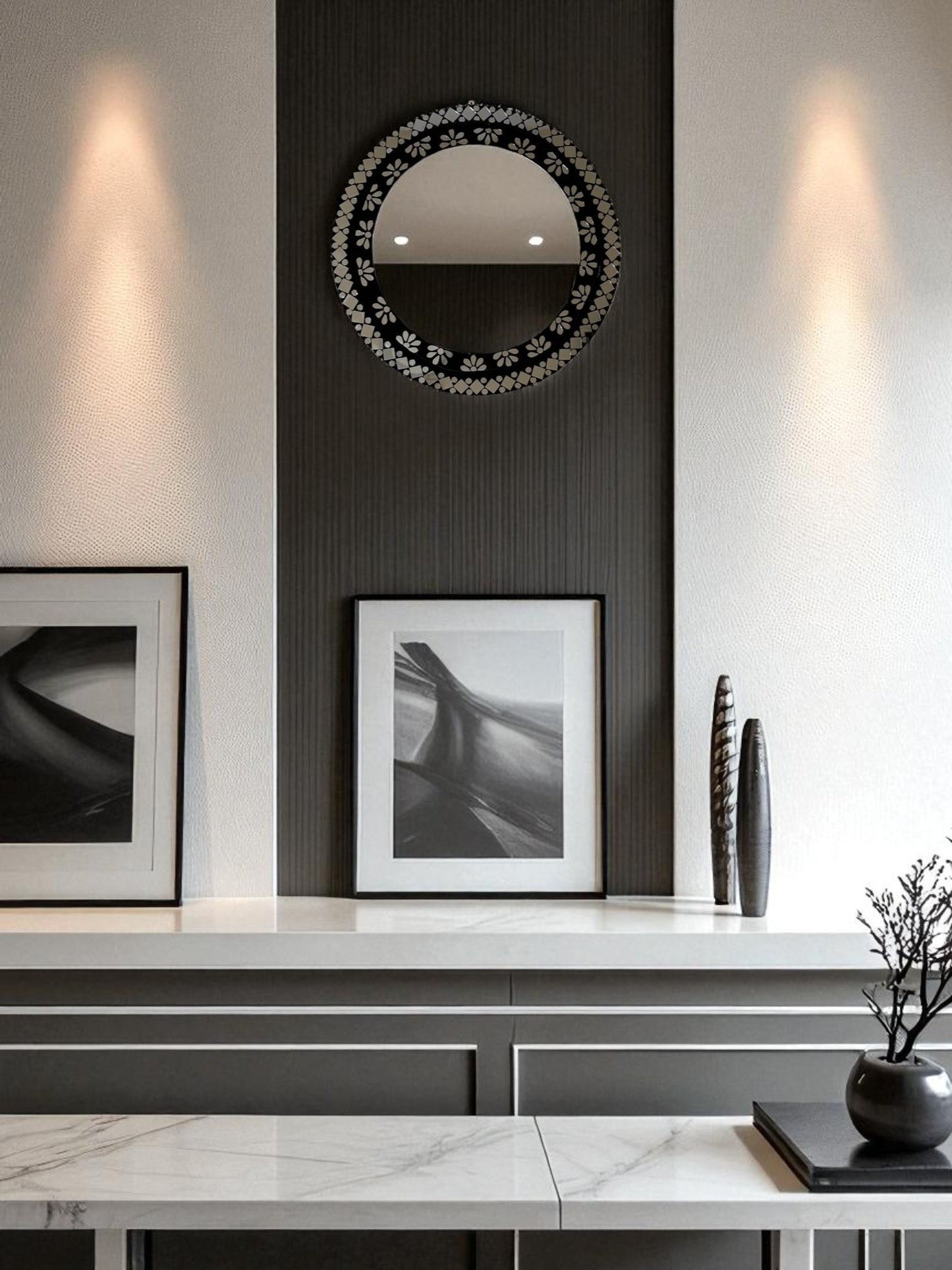 black foral mirror on dark wall