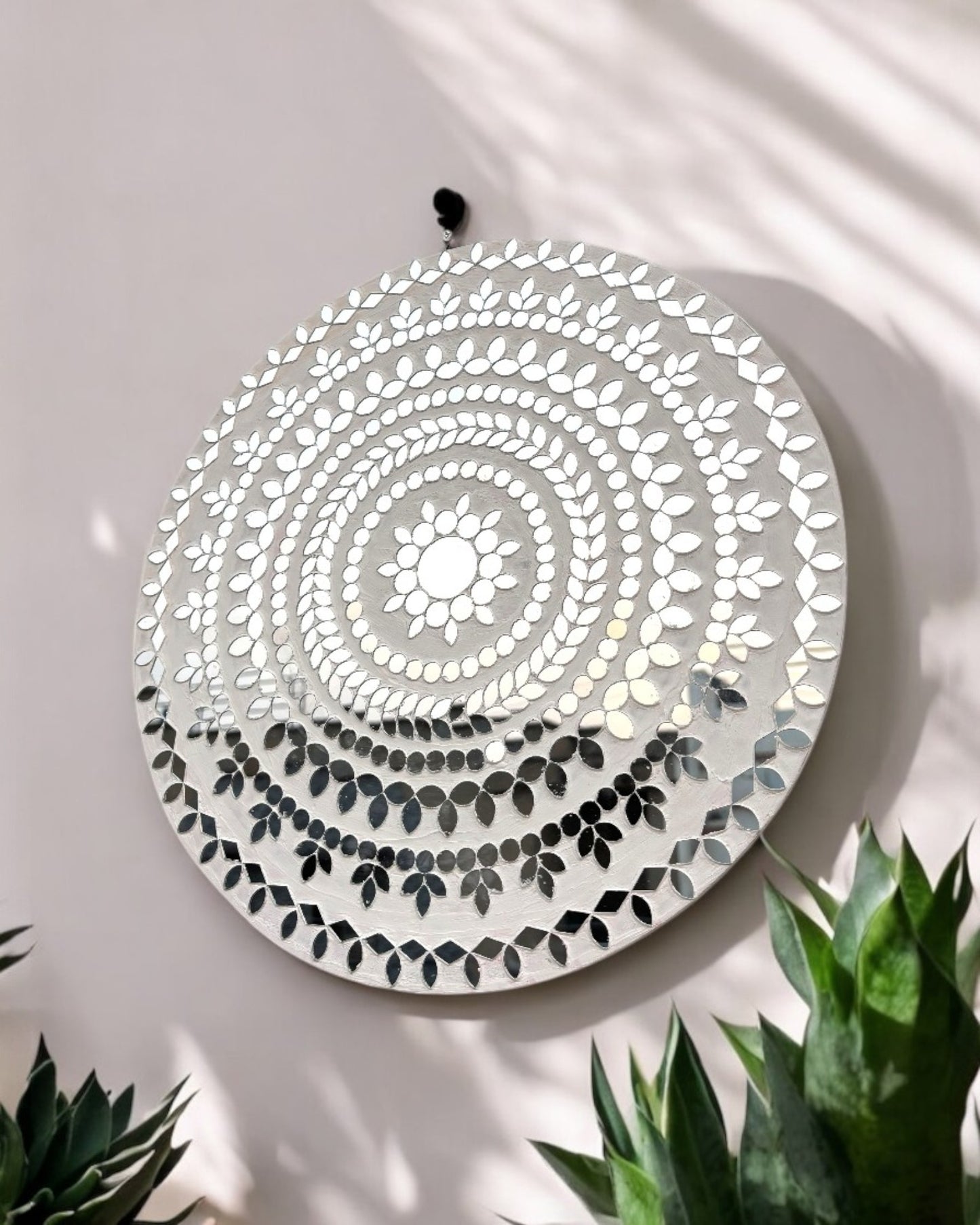 White handcrafted round mosaic mirror wall art with intricate glass pattern by Mirroza