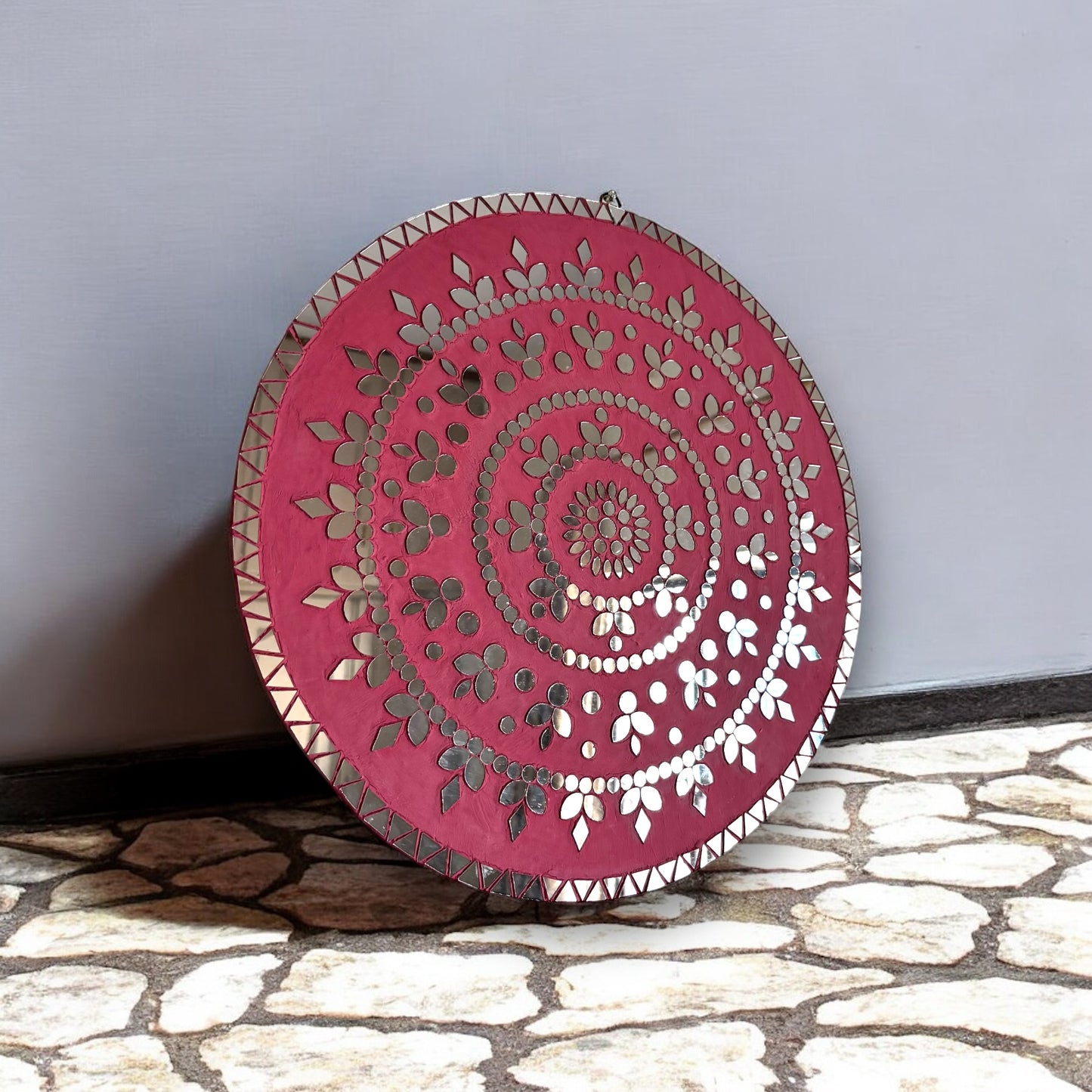 Angled view of Rose Radiance mosaic wall art frame on a textured surface
