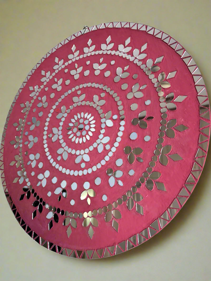 Angled view of Rose Radiance mosaic wall art frame showing depth and texture on a green wall