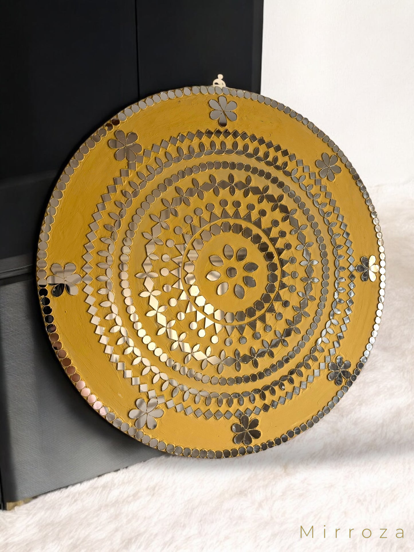 Close-up of the intricate petal glasswork and handmade details of the yellow mosaic mirror wall art.