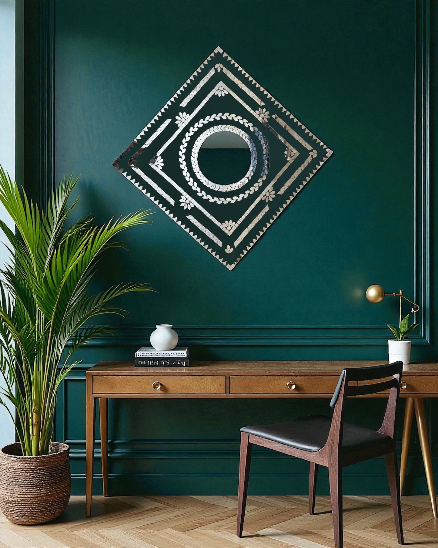Emerald prism mirror mosaic wall hanging on a teal wall above the study table