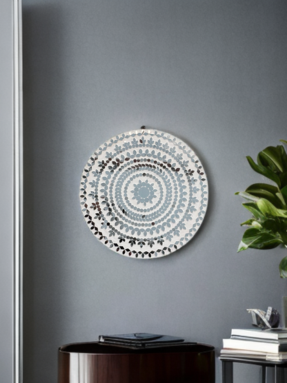 Macro shot showing texture and hand-cut glass tiles on white mosaic mirror