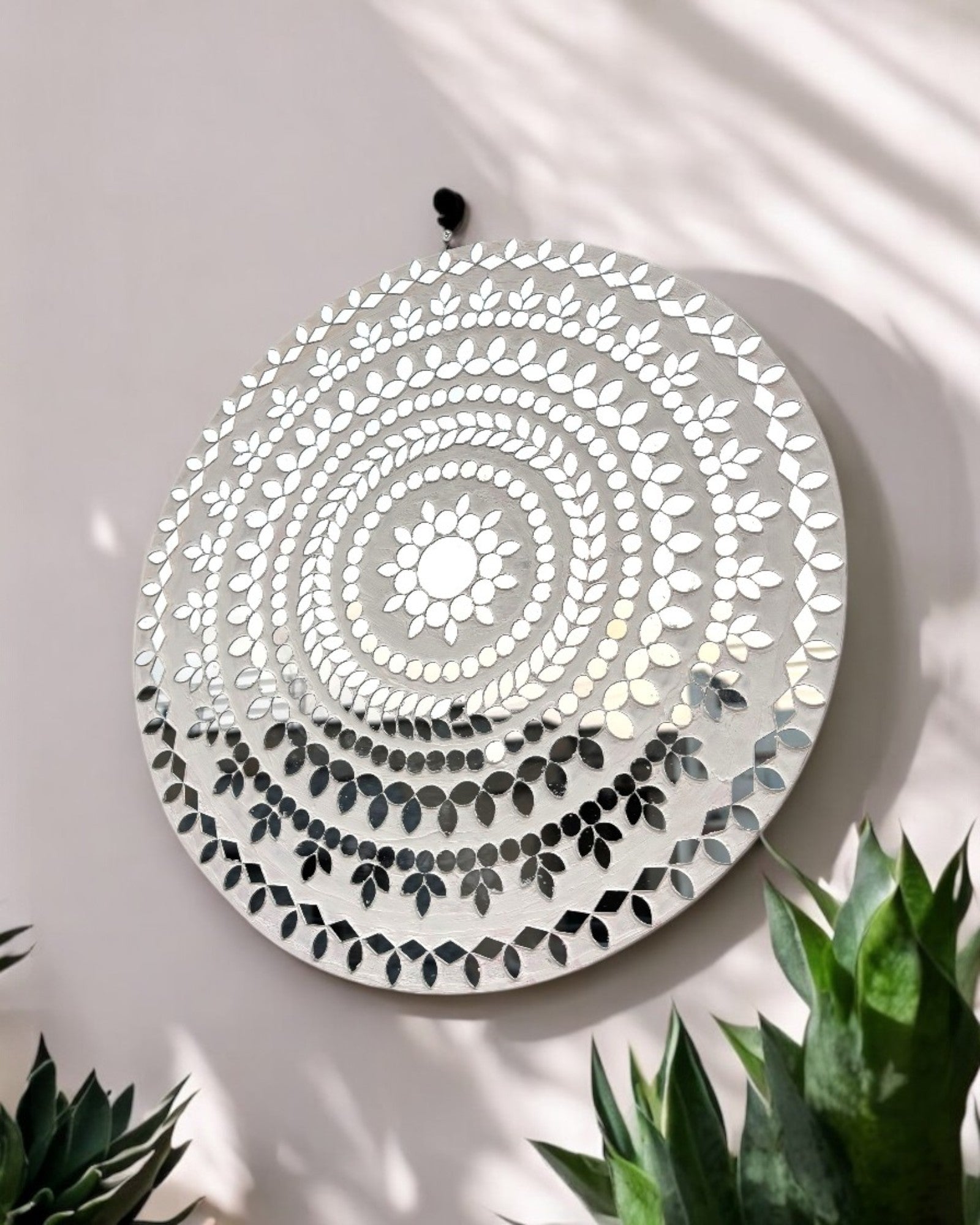 White handcrafted round mosaic mirror wall art with intricate glass pattern by Mirroza
