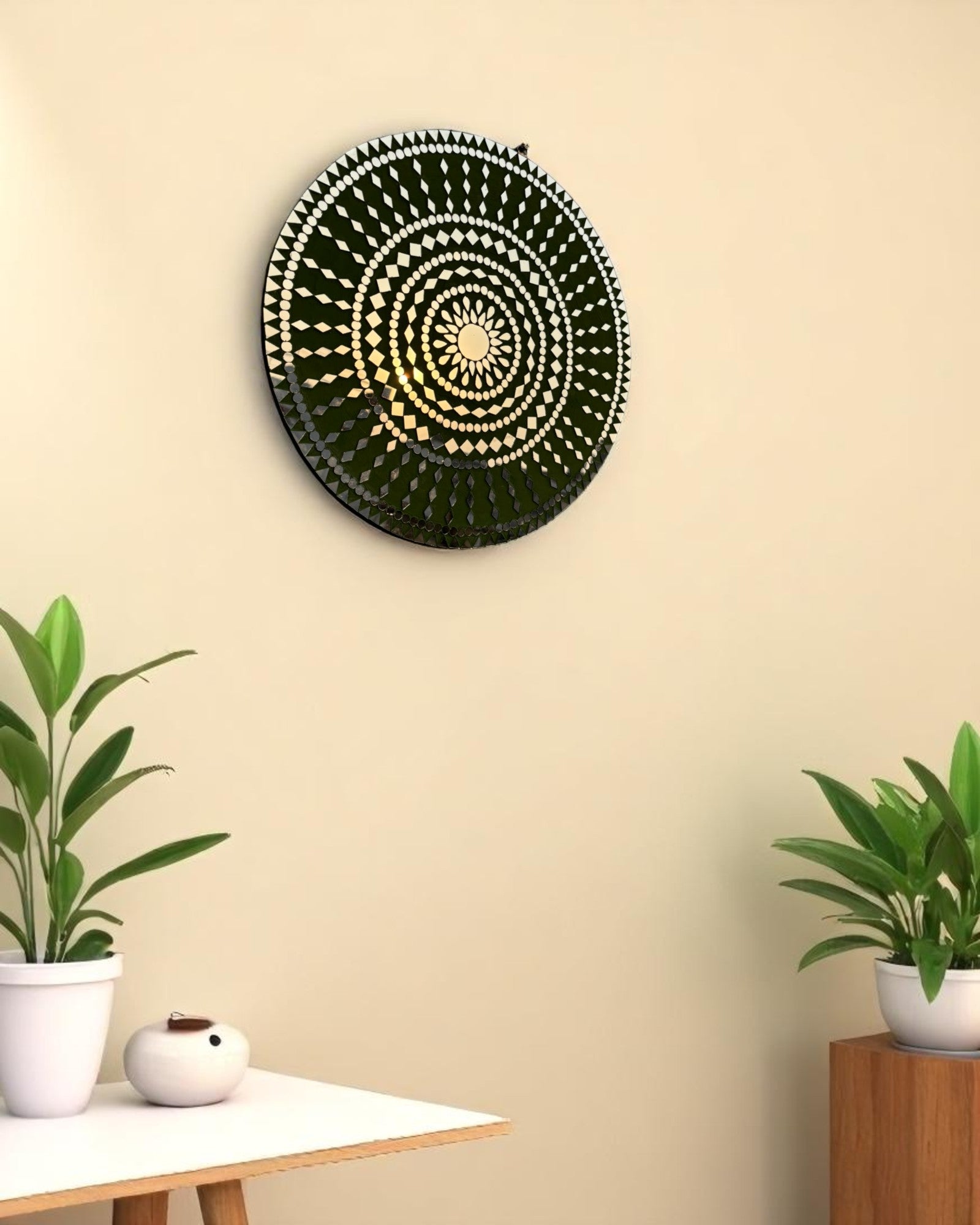 Right angle view of handcrafted Olive Bloom round mosaic wall mirror reflecting light on its intricate glass inlay