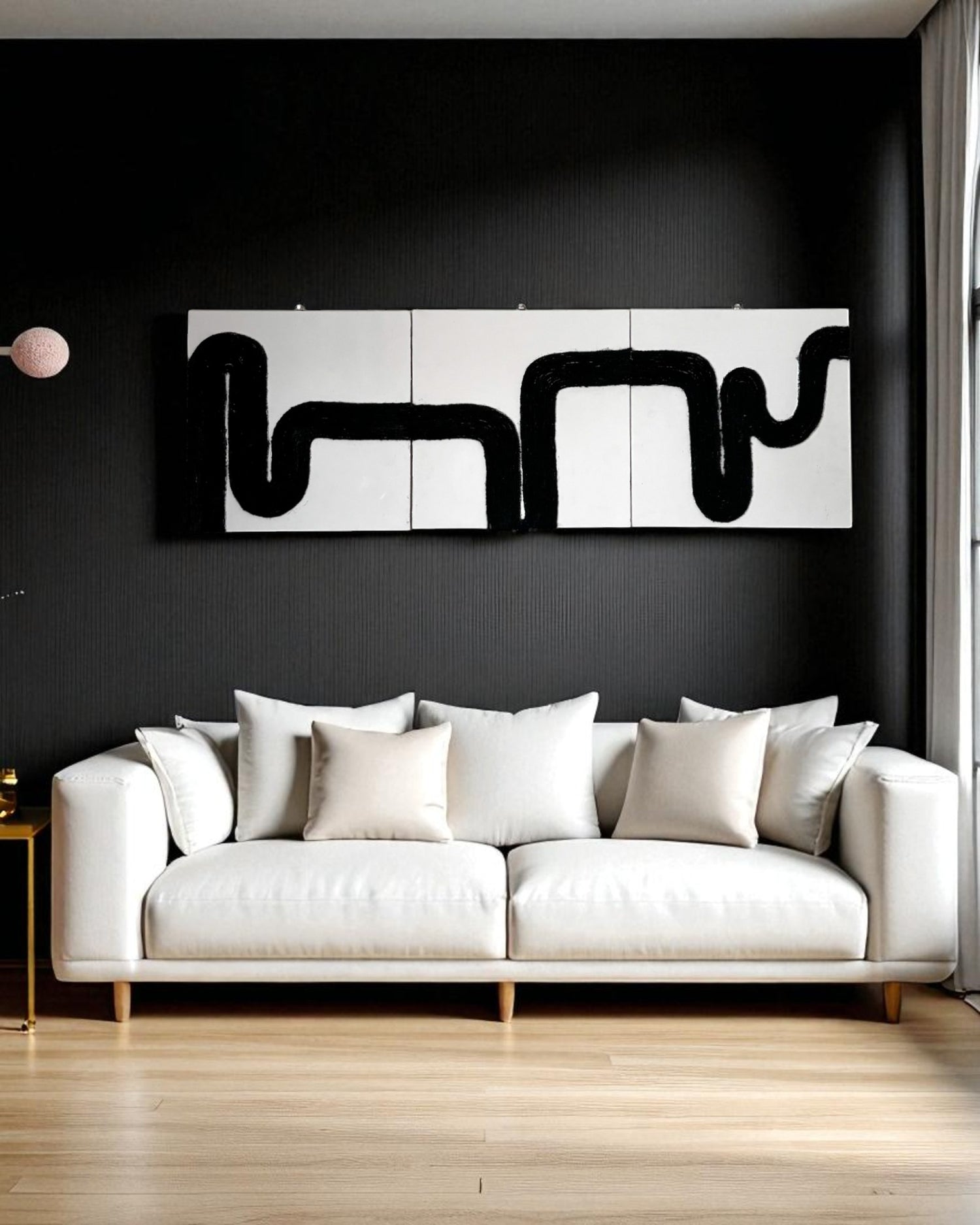 Rope wall art set on dark charcoal wall in elegant living room with emerald sofa and moody lighting